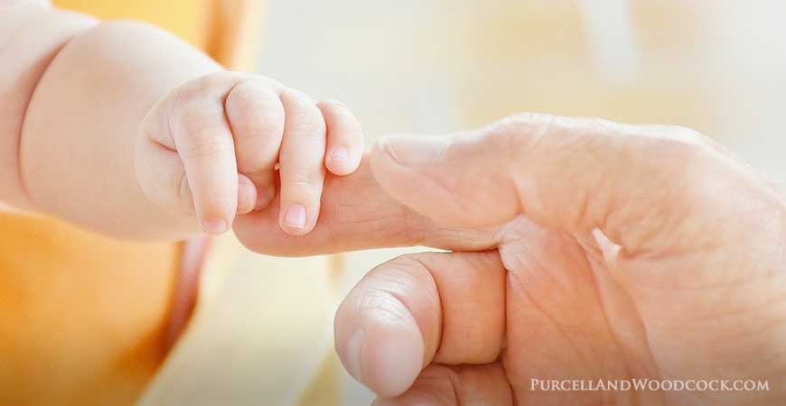 Baby Holding Parent's Finger