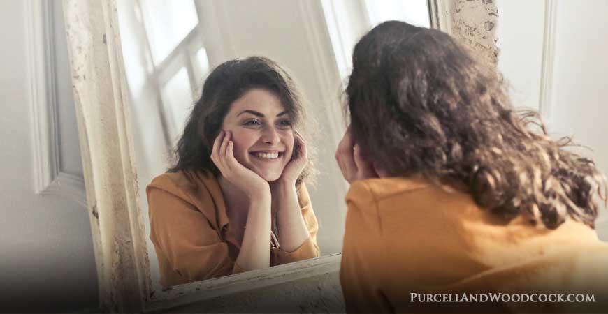 Woman Looking at Her Reflection
