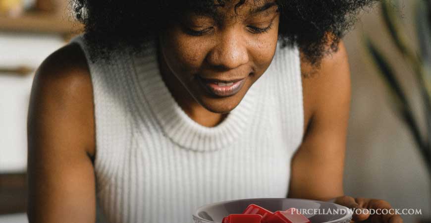 Woman Smelling Fragrance