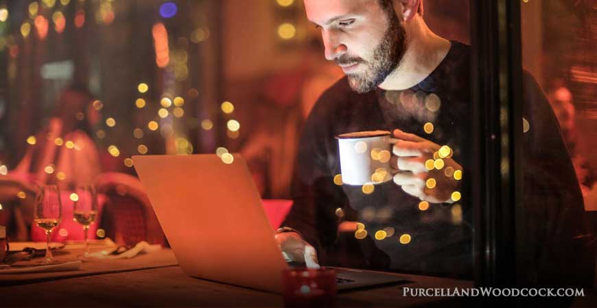 Man Working in Candlelight